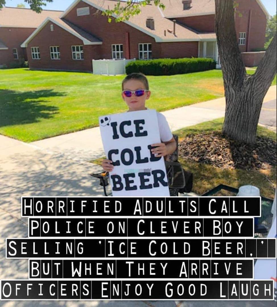 Authorities are called to investigate a boy selling ‘Ice Cold Beer,’ but his ingenious sign makes them giggle.