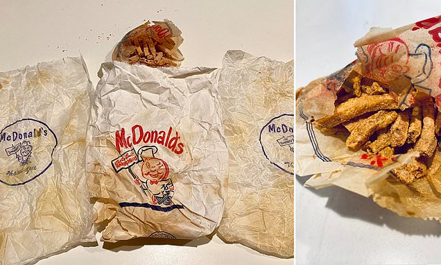 A couple discovering 63-year-old stored McDonald’s fries in their bathroom wall while restoring their home.
