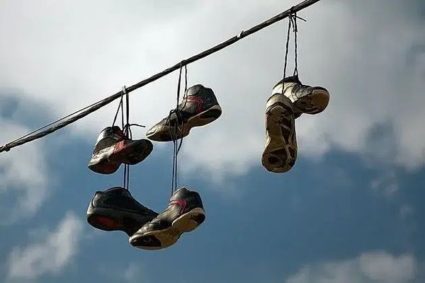 The Fascination of Sneakers on Power Lines