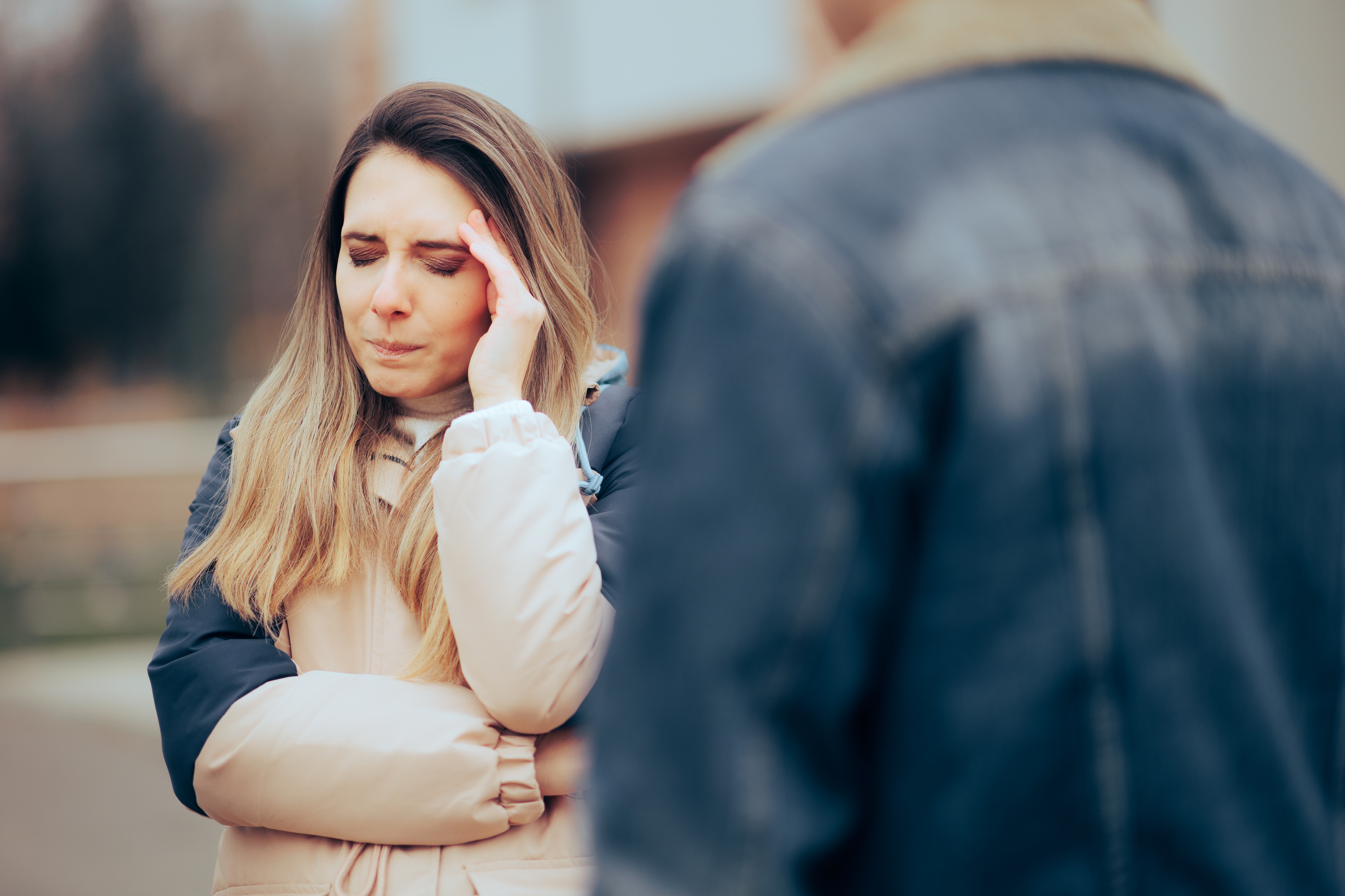 Couple having an argument outdoors | Source: Shutterstock