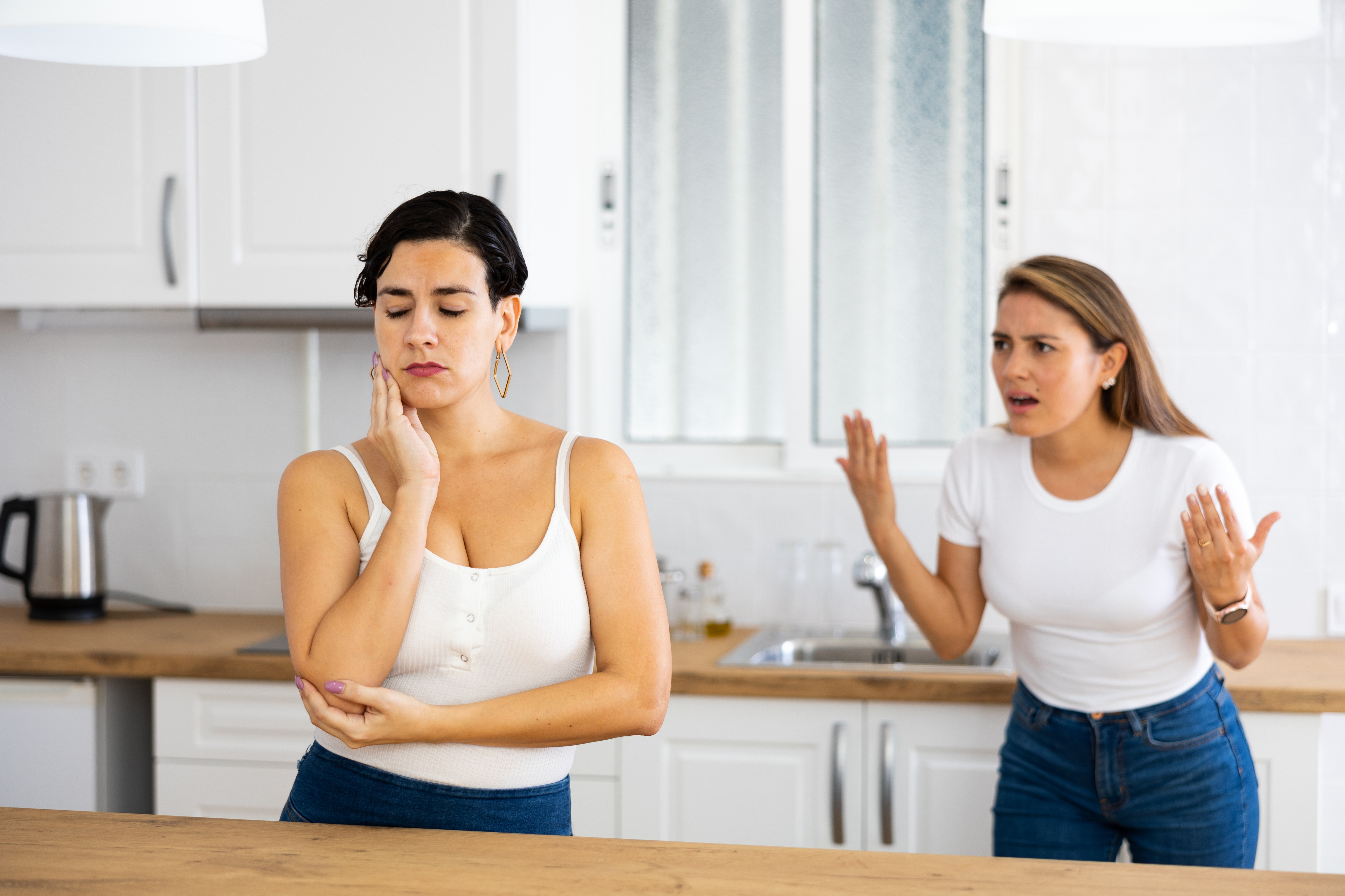 A frustrated woman shouting at another woman | Source: Getty Images