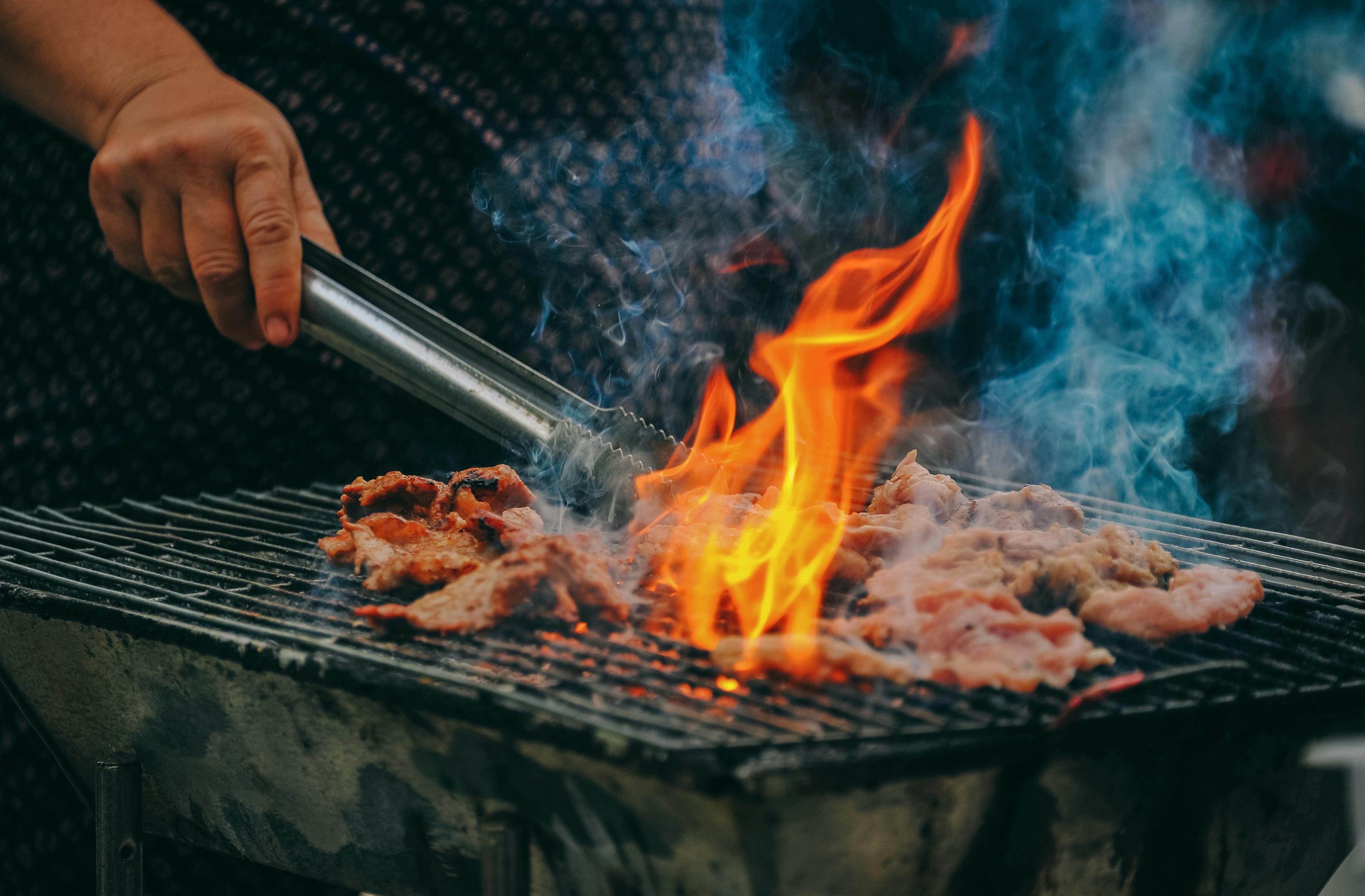 Grilling meat | Source: Pexels