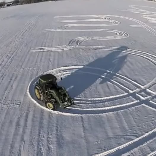 Farm Creates Stunning Tractor Snow Art, Spreading Holiday Cheer