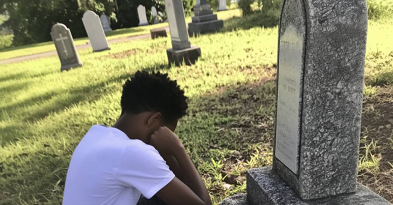 At His Adoptive Mother’s Grave, a Boy Discovers an Envelope with His Name