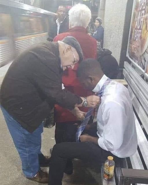 HE SAT STRUGGLING WITH HIS TIE—THEN A STRANGER STOPPED AND SAID FOUR WORDS