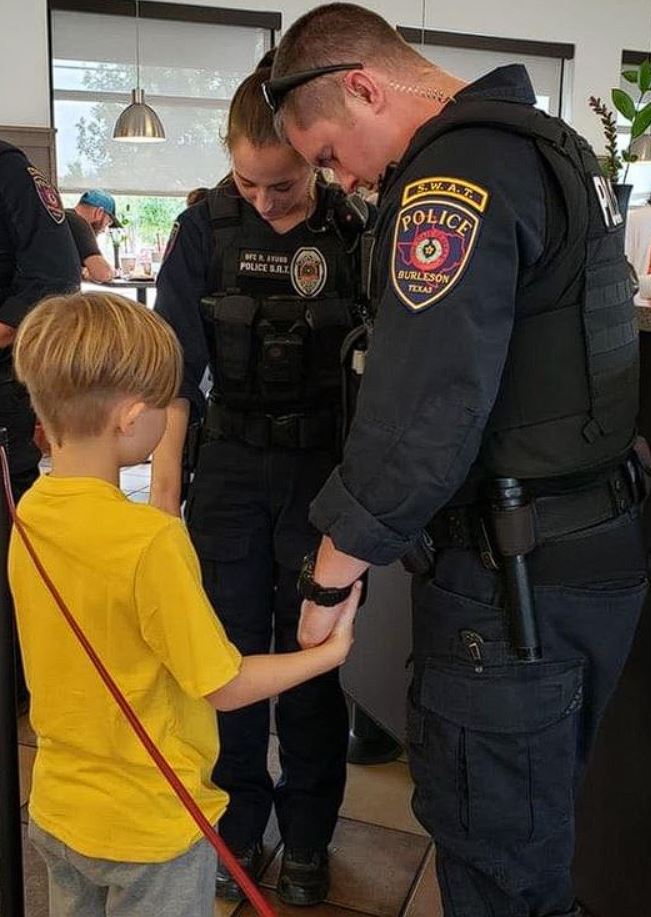 HE WALKED RIGHT UP TO THREE COPS AND ASKED IF HE COULD PRAY FOR THEM