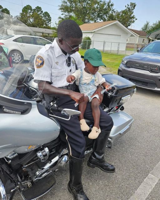 MY SON CLIMBED ON A POLICE MOTORCYCLE—AND WHISPERED SOMETHING THAT MADE THE OFFICER GO SILENT