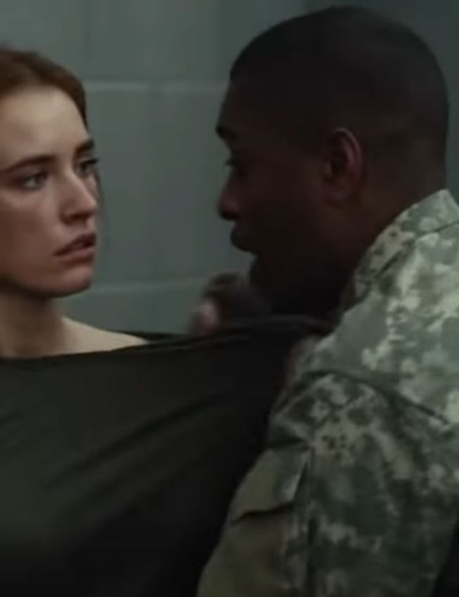 A soldier, mocked for her appearance