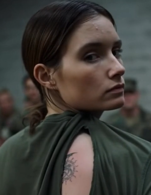 A soldier, ridiculed for her looks