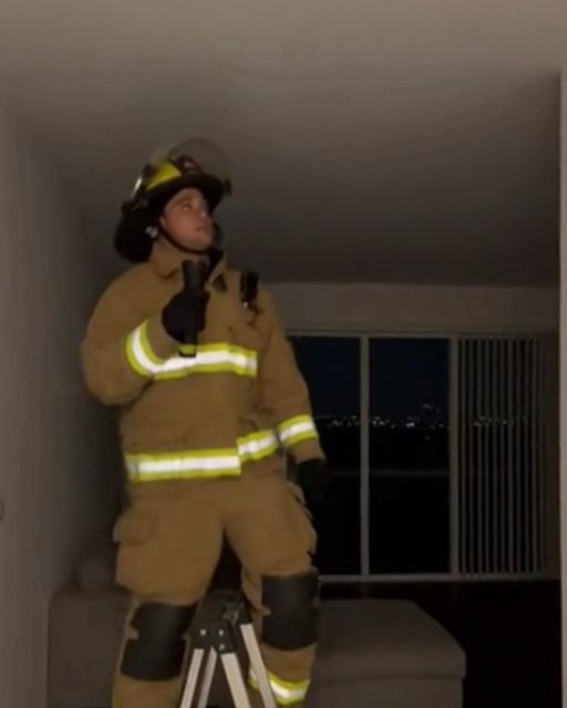 Firefighter Checks A Smoke Alarm At 3 A.m.—the Apartment Is Empty