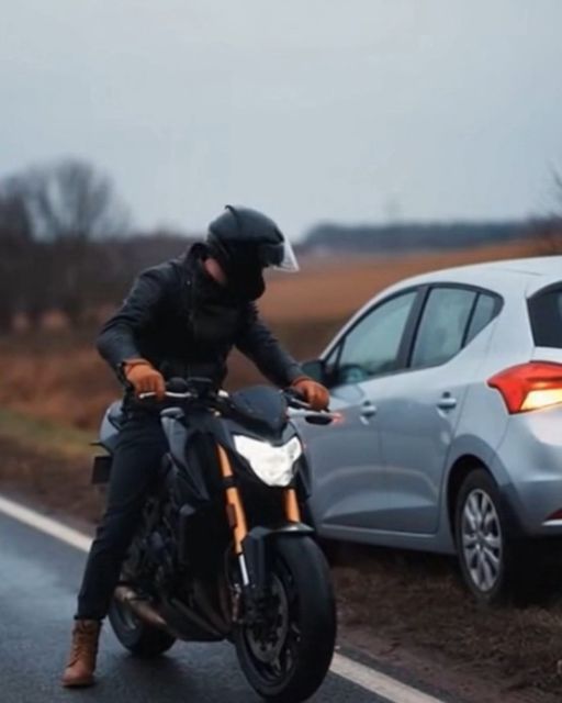 Biker Stops After Seeing A Car With Hazards—the Driver Won’t Make Eye Contact