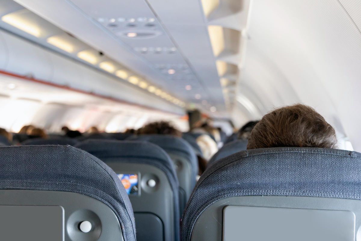 I Was Seated Next to a Stranger on My Husband’s Business Flight — What She Told Me Changed Everything