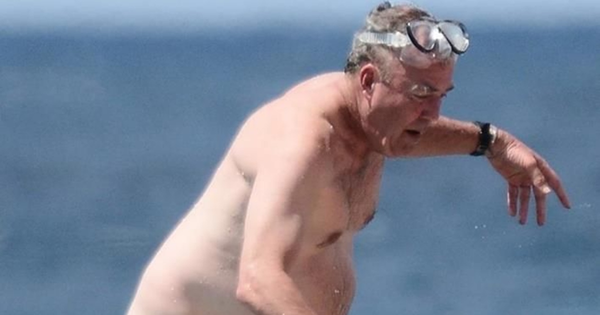 Famous TV Personality Spotted Enjoying a Rare Beach Escape: Can You Recognize Him?